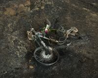 the burnt out remains of a motorcycle